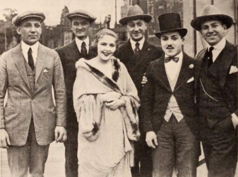 From left: Film producer Sam Warner, exhibitor Joe Marks from Youngstown, Ohio, actress Florence Gilbert, racing pilot Art Klein, comic actor Monty Banks, and film producer Jack Warner. From page 82 of the Feb. 28, 1920 Exhibitors Herald. (Image courtesy of Wikimedia)