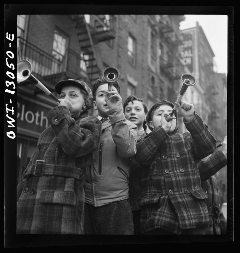 Blowing horns on New Year’s, 1943